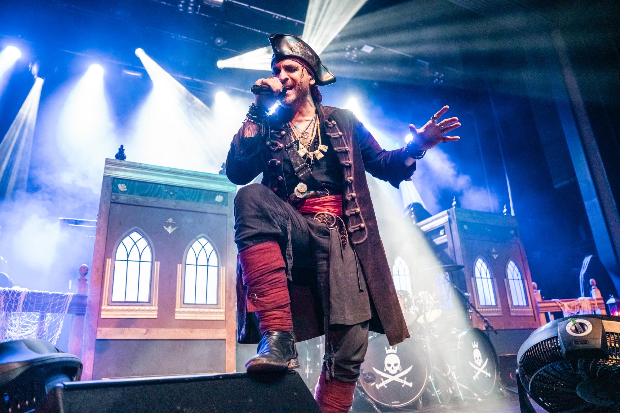 Michele Guiatoli in full pirate garb singing to the audience