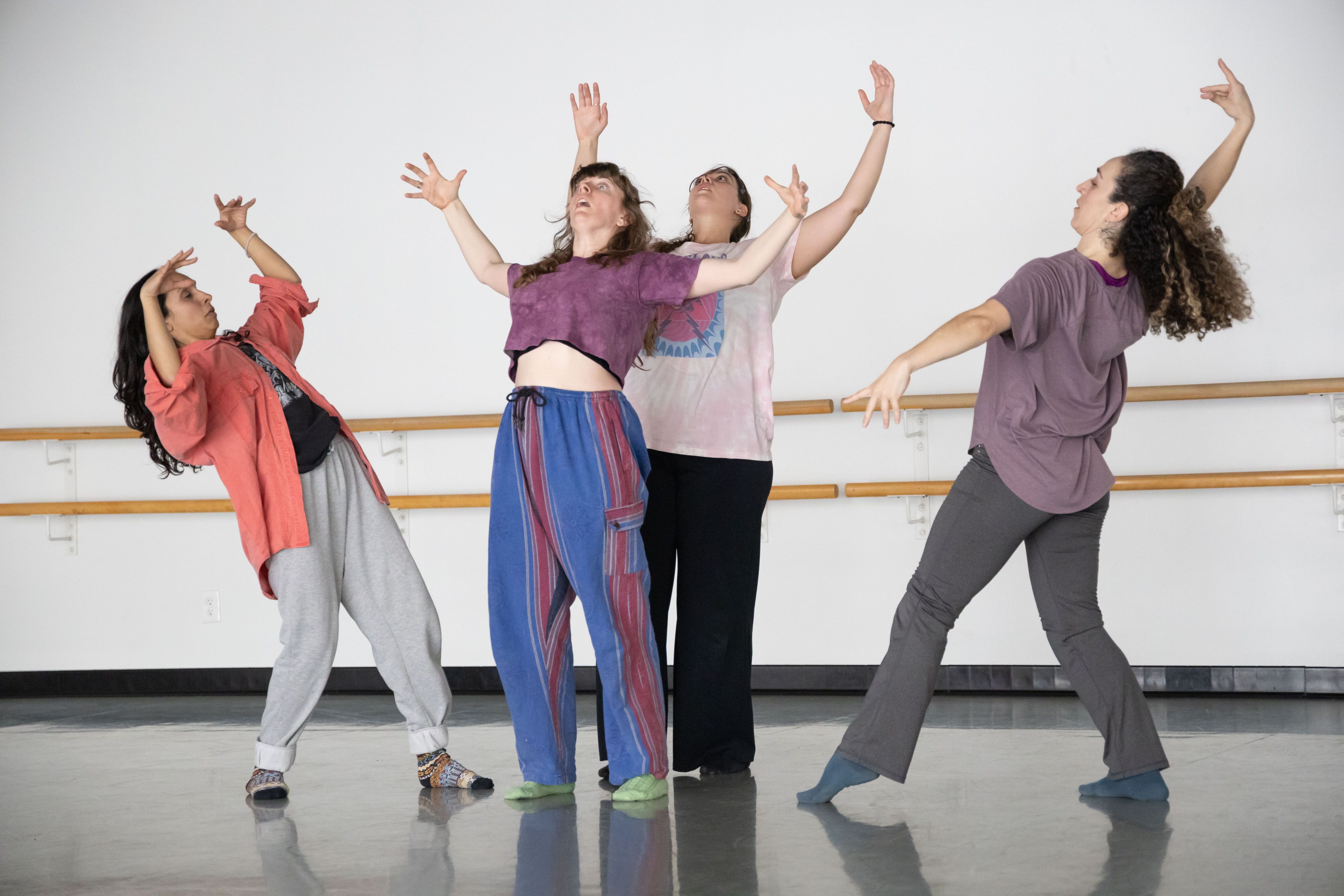 The dancers of Soma Anima Arts are propelled from the centre of the stage with gestures