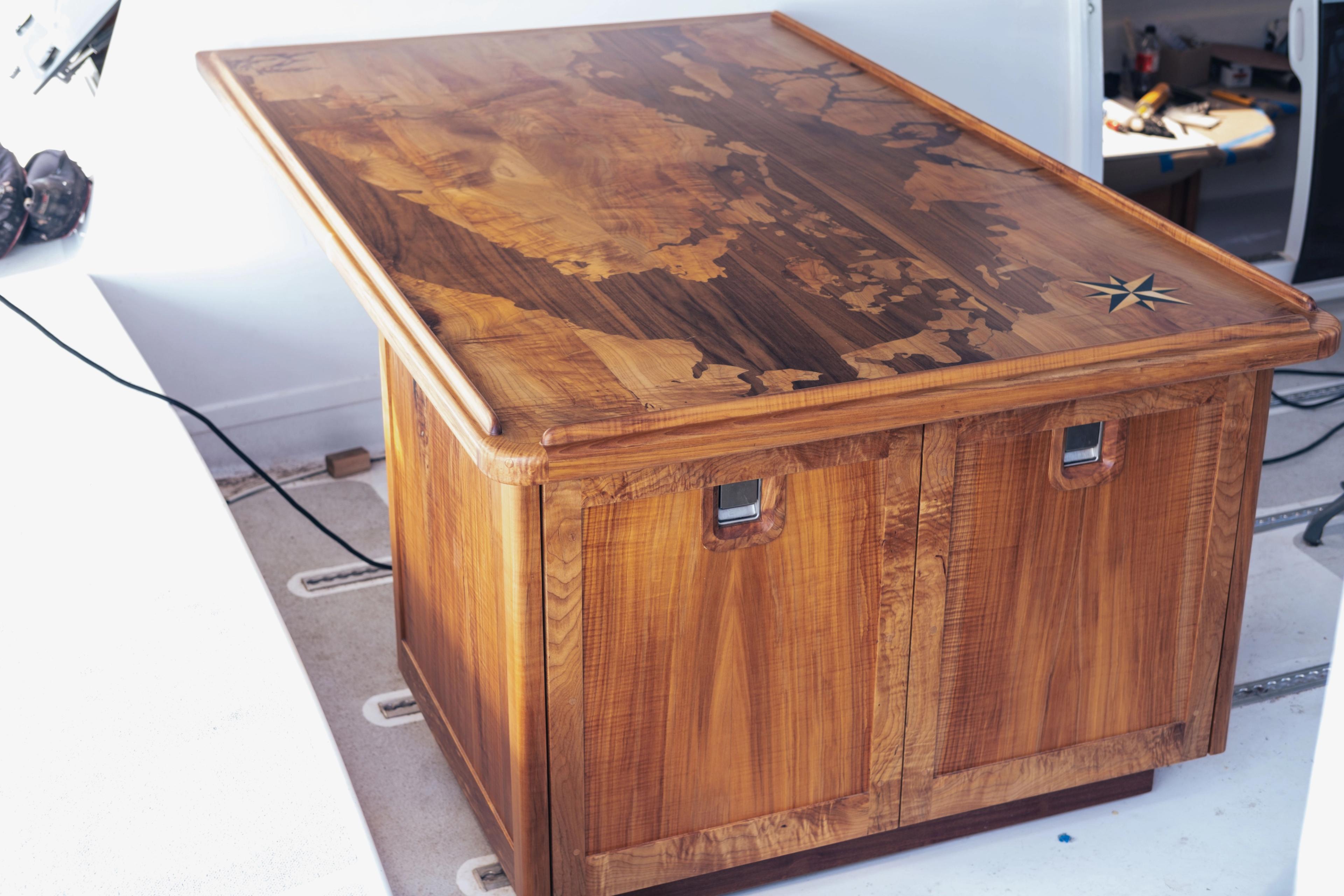 Salon table and refrigerator and freezer cabinets