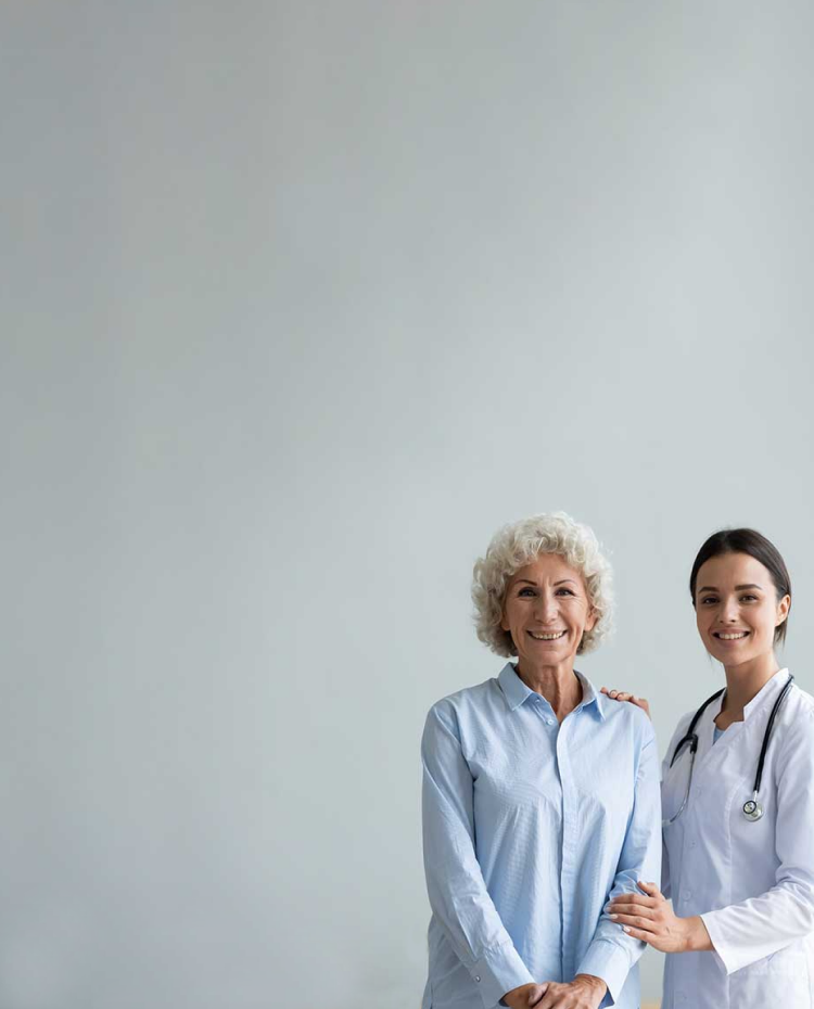 Doctor and a patient standing together.