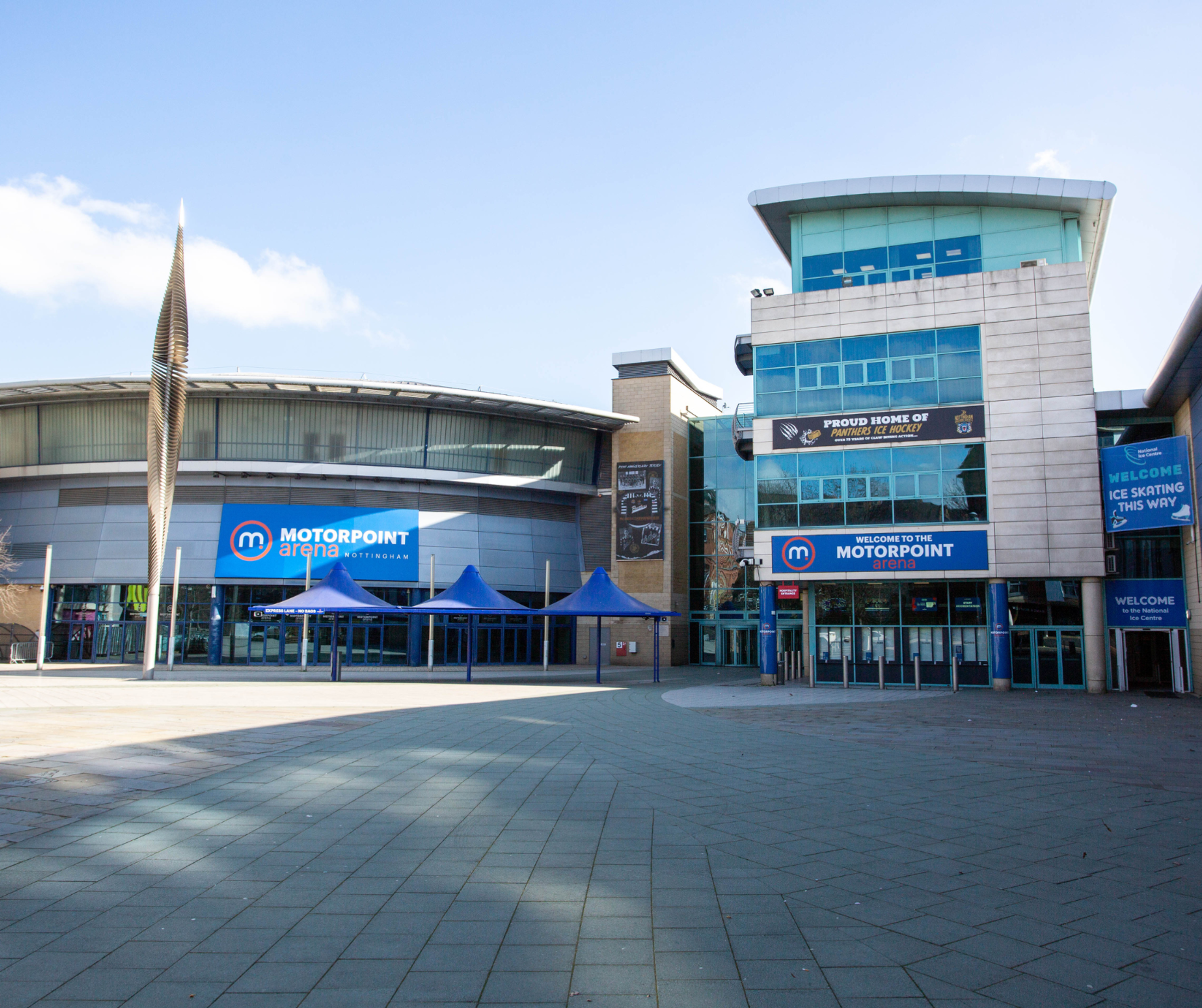 The entrance to the Motorpoint Arena in Nottingham on a clear day.