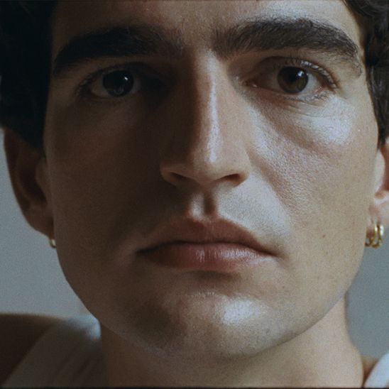 Front-facing portrait of a young man with clear, healthy skin — a beginner's guide to men's skincare by Apollon Studios
