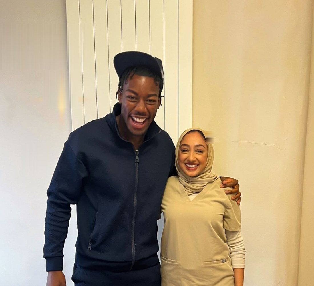 Dr Zoya Ahmed with professional footballer Anthony Elanga