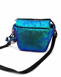Iris — iridescent crossbody bag, side view with rainbow zipper detail, ODDANA