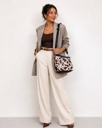 Savanna bag styled with grey outfit