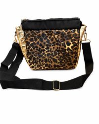 Elysian leopard crossbody bag front view showing leopard print and gold panels
