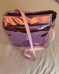 Aurora holographic pink crossbody bag - front view with rainbow heart zipper