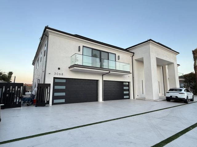 Modern white estate, entry elevation