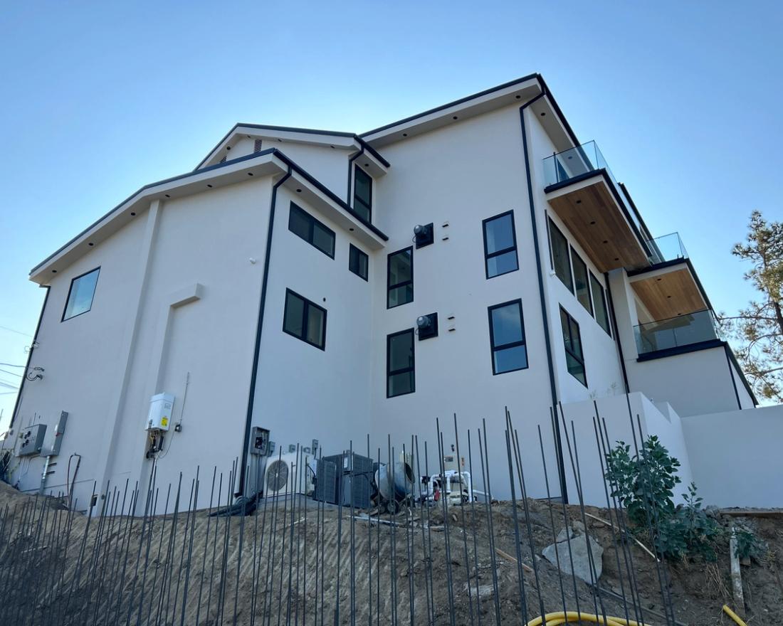 Finished three-story modern remodel, smooth coat — Duarte's Plastering project near Anaheim, CA