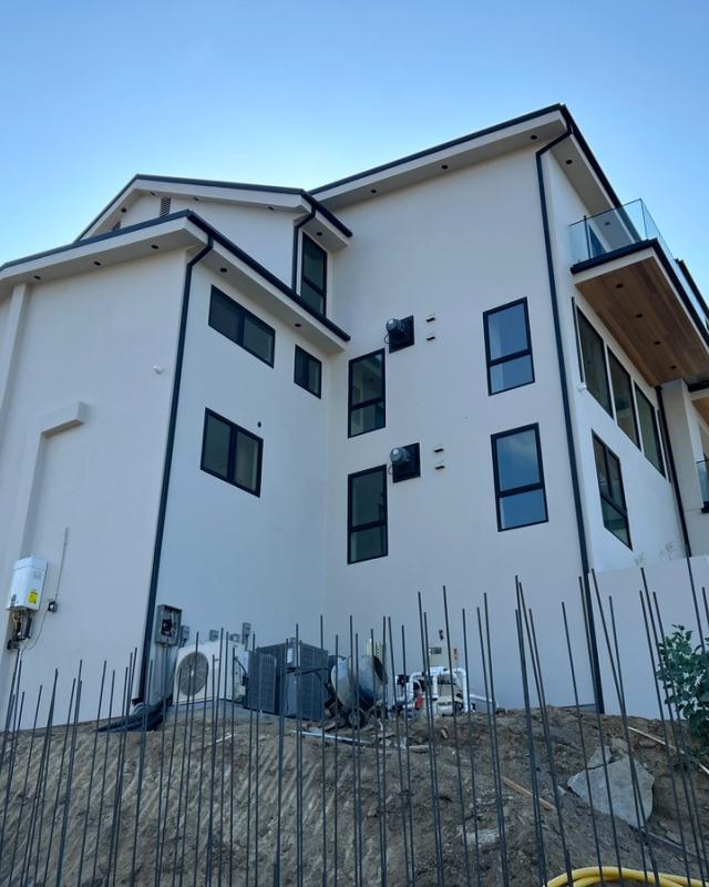Finished three-story modern remodel, smooth coat