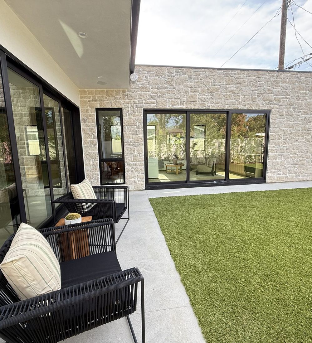 Finished limestone and smooth stucco courtyard by Duarte’s Plastering