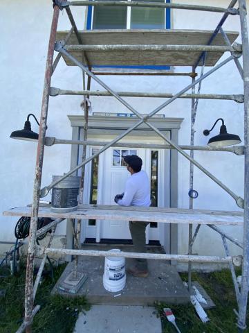 Foam trim install at entry portico