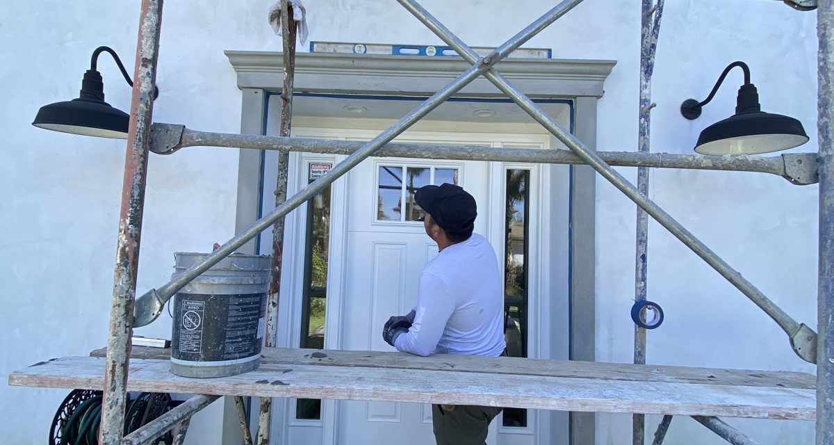 Foam trim install at entry portico