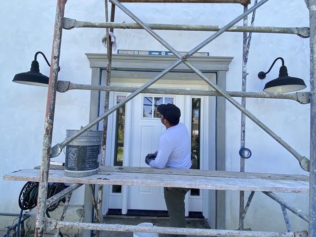 Foam trim install at entry portico