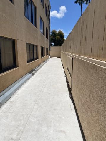 Commercial side elevation, fresh finish coat