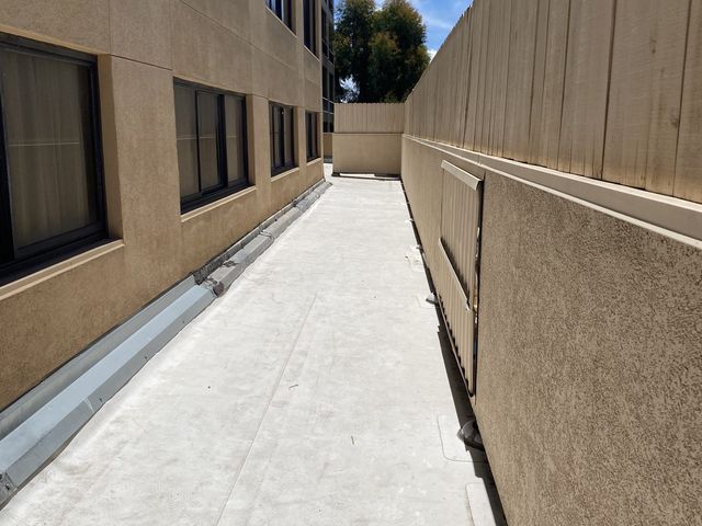 Commercial side elevation, fresh finish coat