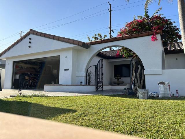 Completed remodel, arched garage and lawn — Duarte's Plastering project near Lakewood, CA