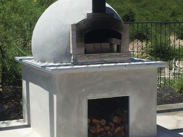 Custom outdoor pizza oven, smooth stucco finish