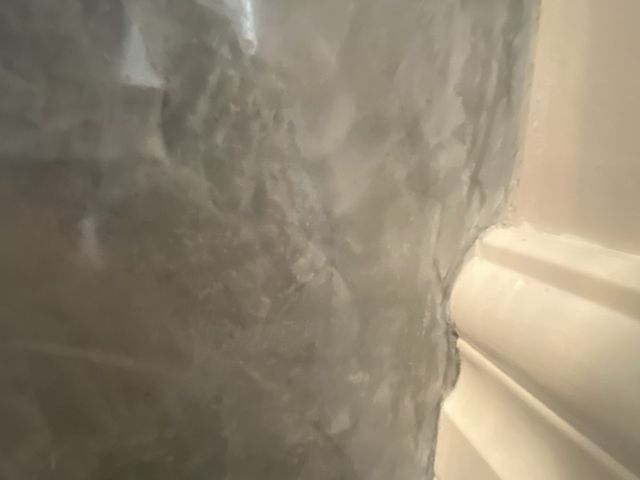 Venetian plaster in warm taupe, hand burnished