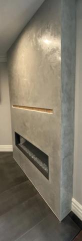 Venetian plaster media wall with linear fireplace
