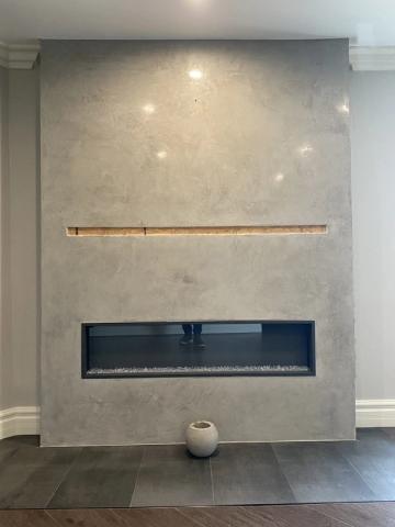 Plaster fireplace wall with reveal detail