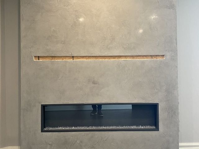 Plaster fireplace wall with reveal detail