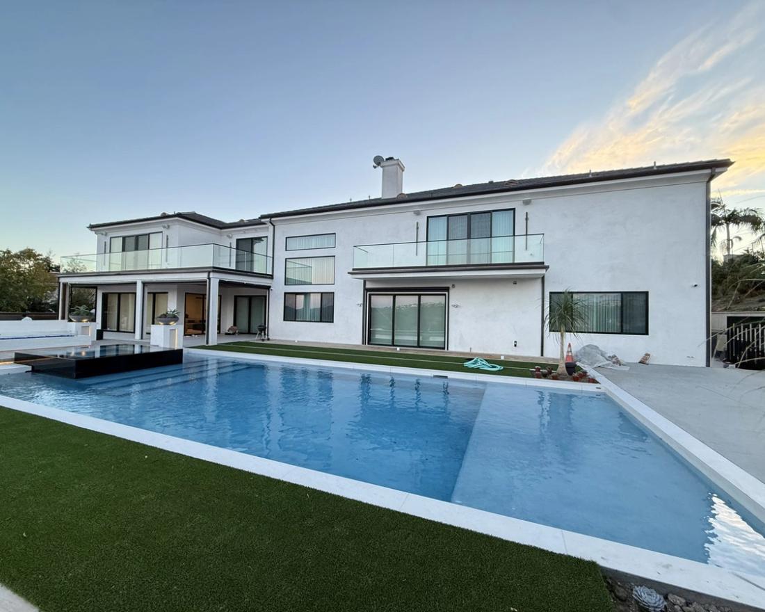 Estate rear elevation, smooth finish and pool deck — Duarte's Plastering project near Lakewood, CA