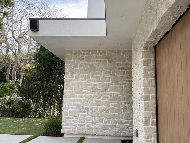Limestone and smooth stucco, custom home — Duarte's Plastering project near Irvine, CA