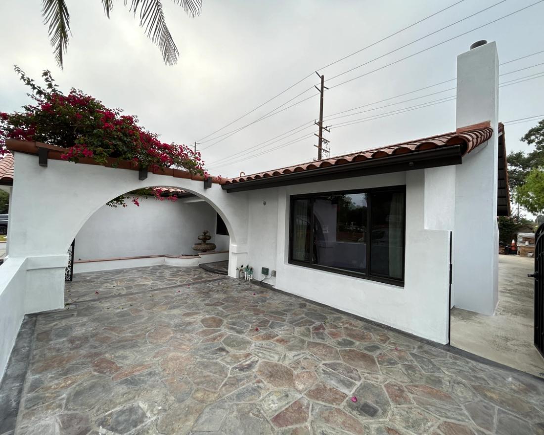 Completed Spanish-style remodel, arches & courtyard — Duarte's Plastering project near Fullerton, CA