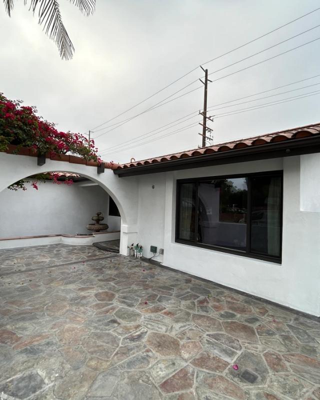 Completed Spanish-style remodel, arches & courtyard