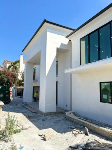 Smooth stucco grand entry — Duarte's Plastering project near Irvine, CA