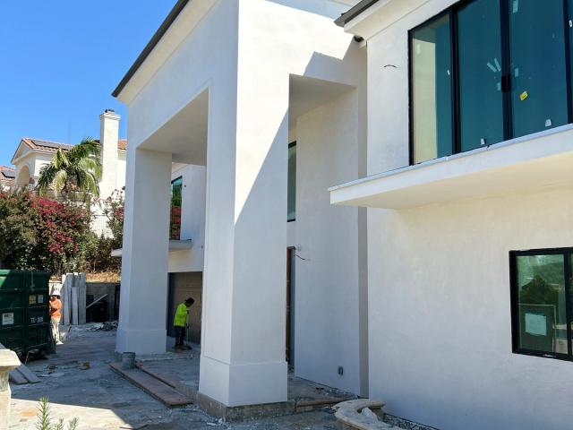 Smooth stucco grand entry — Duarte's Plastering project near Irvine, CA