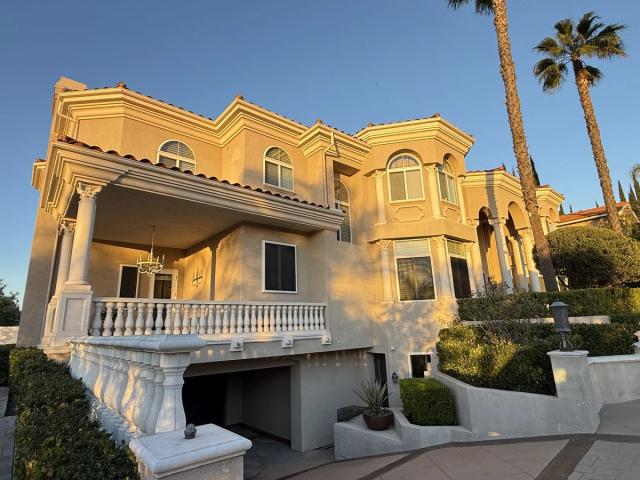 Completed estate exterior with balustrades — Duarte's Plastering project near Fullerton, CA