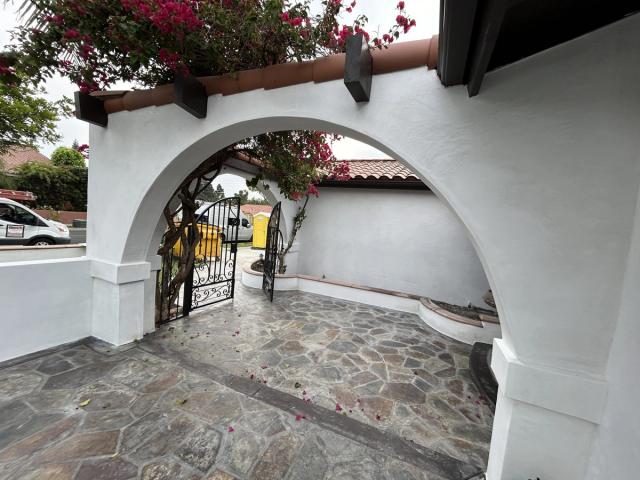 Finished archway with bougainvillea, Spanish remodel — Duarte's Plastering project near Long Beach, CA
