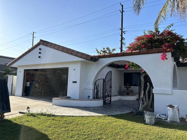 Completed Spanish remodel with arched garage, Huntington Beach — Duarte's Plastering project near Huntington Beach, CA