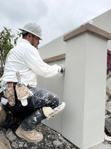 Acrylic finish coat, hand troweling — Duarte's Plastering project near Santa Ana, CA