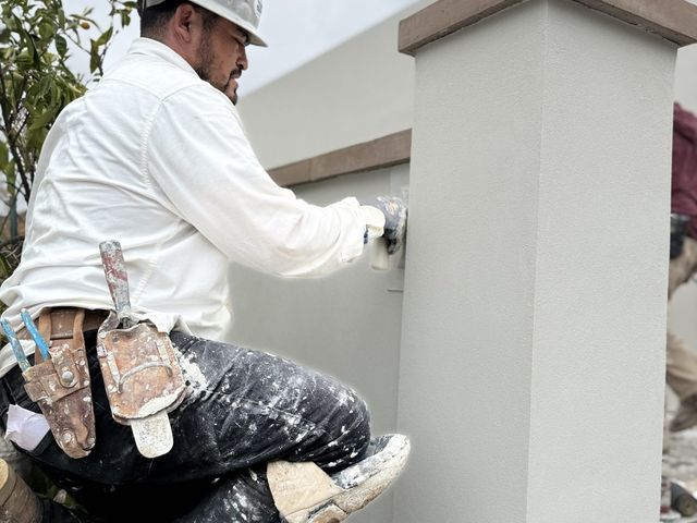 Acrylic finish coat, hand troweling — Duarte's Plastering project near Santa Ana, CA