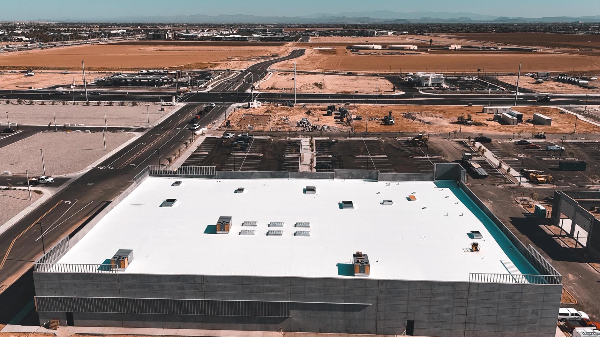 Finished white TPO roof on the EOS Fitness building in Surprise, Arizona