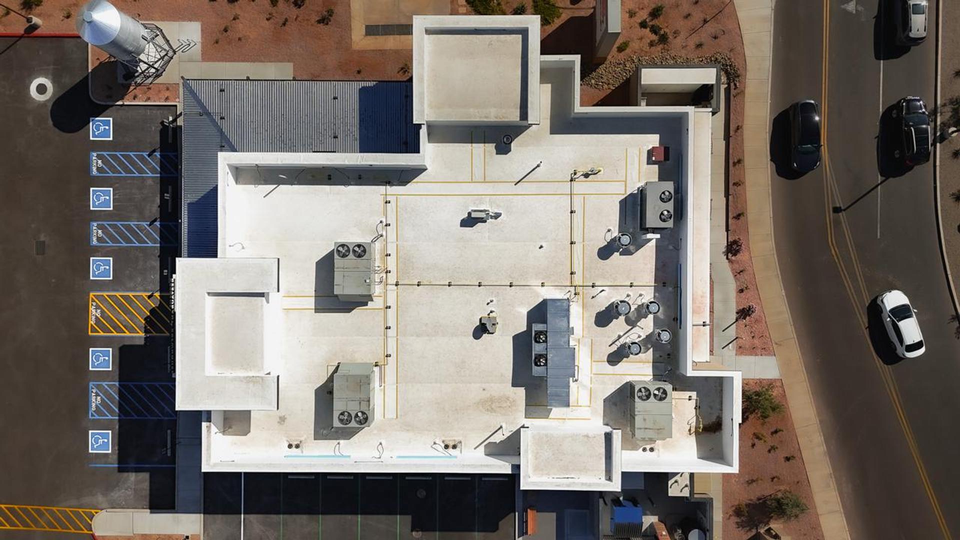 Top-down view of the fully adhered TPO roof at BJ's Queen Creek