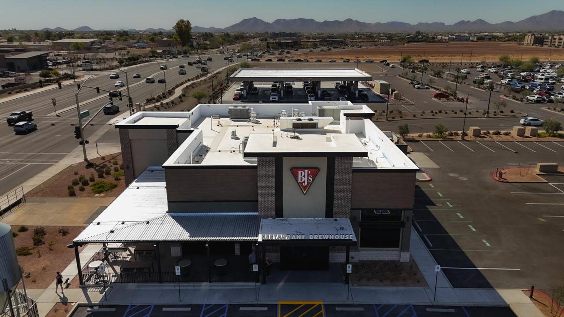 BJ's Restaurant & Brewhouse, Queen Creek — front entrance with the new white TPO roof