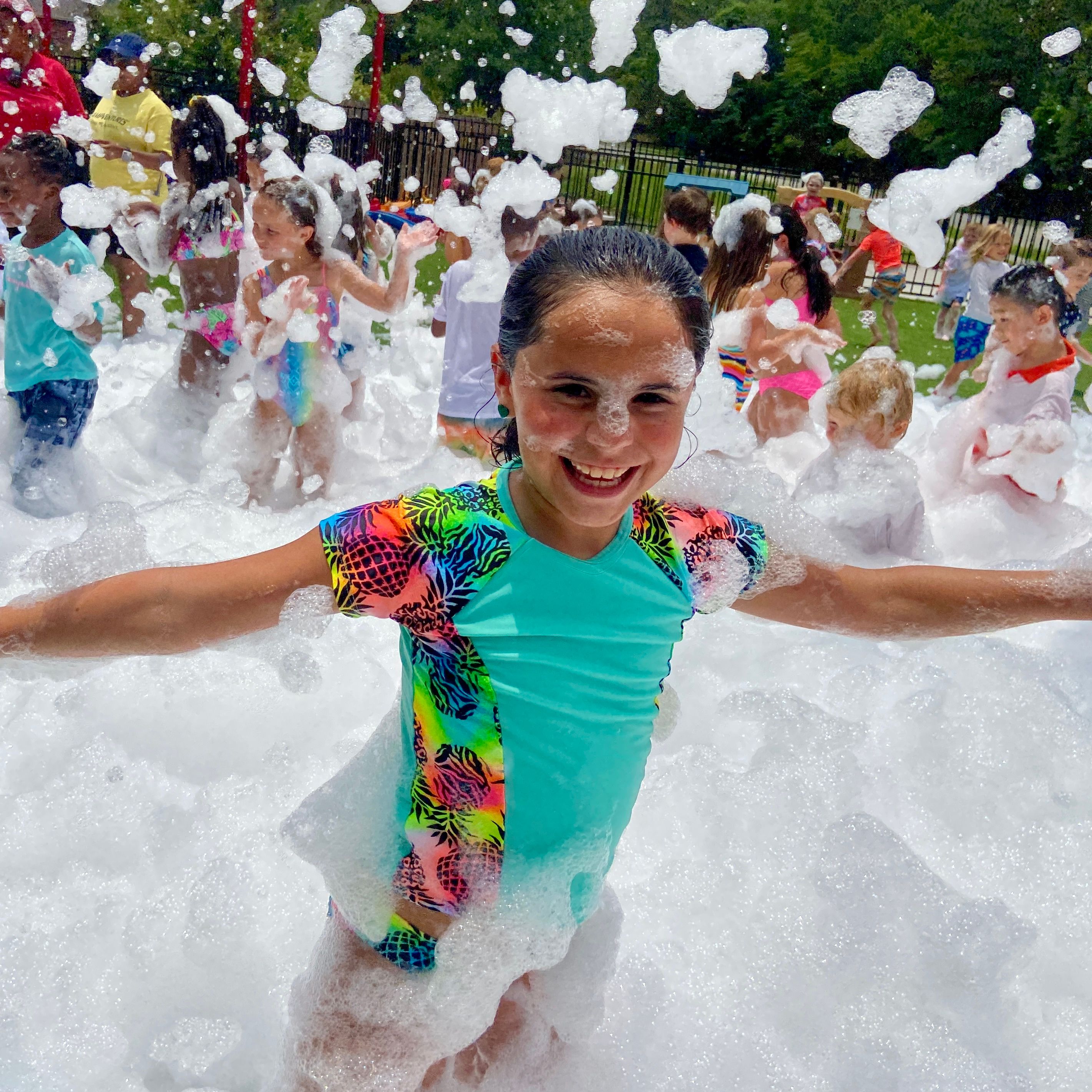 Kids playing in foam at a Foam Palooza party in Cape Coral, FL