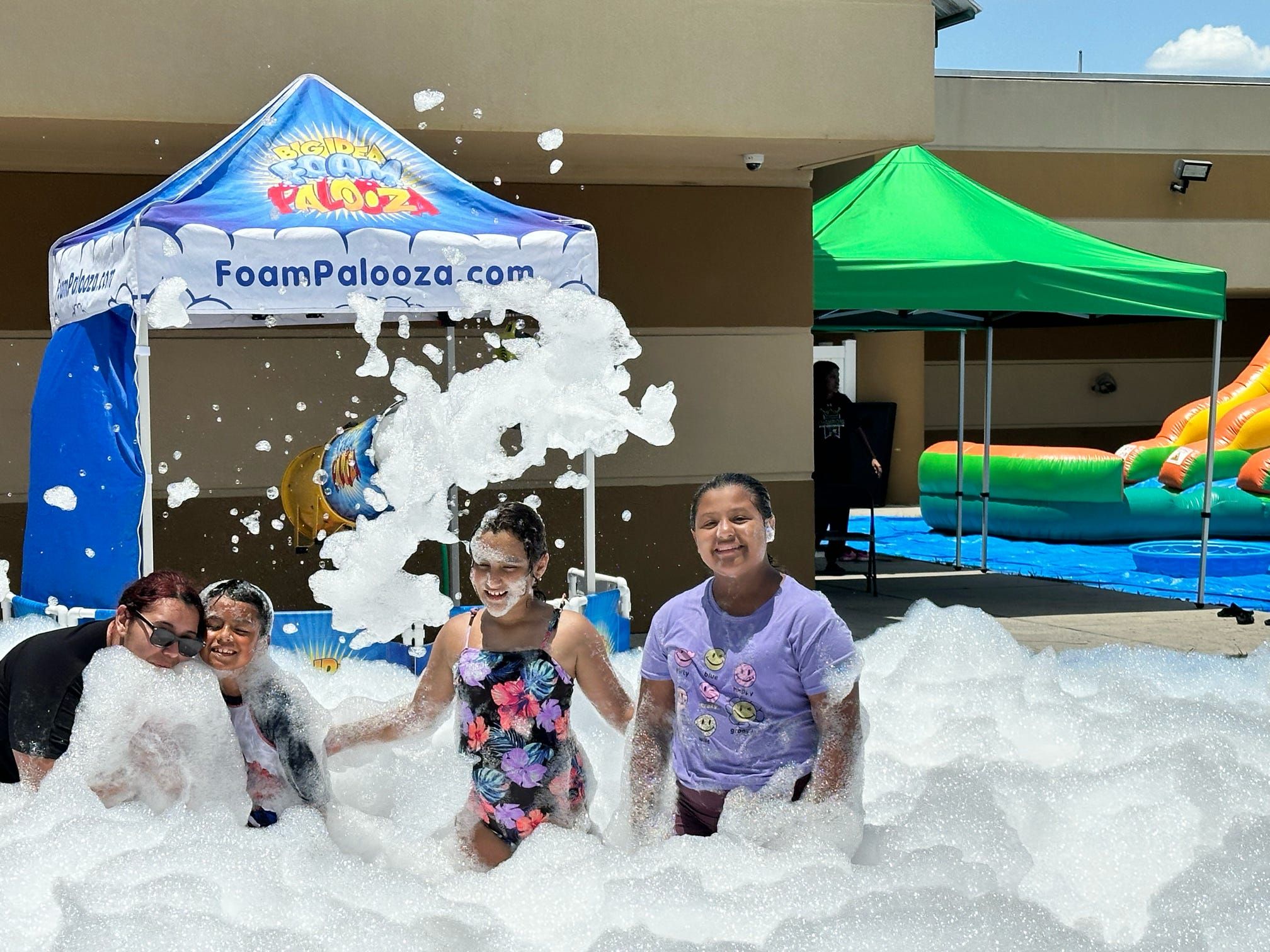 Kids playing in foam at a Foam Palooza party in Winter Garden, FL
