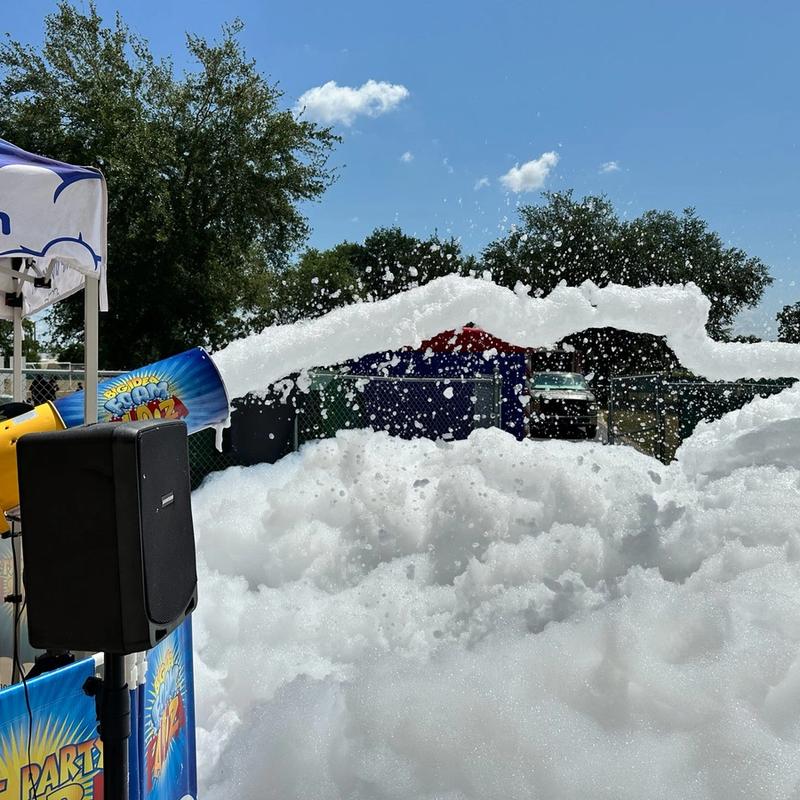 Foam cannon filling up a backyard for a birthday party