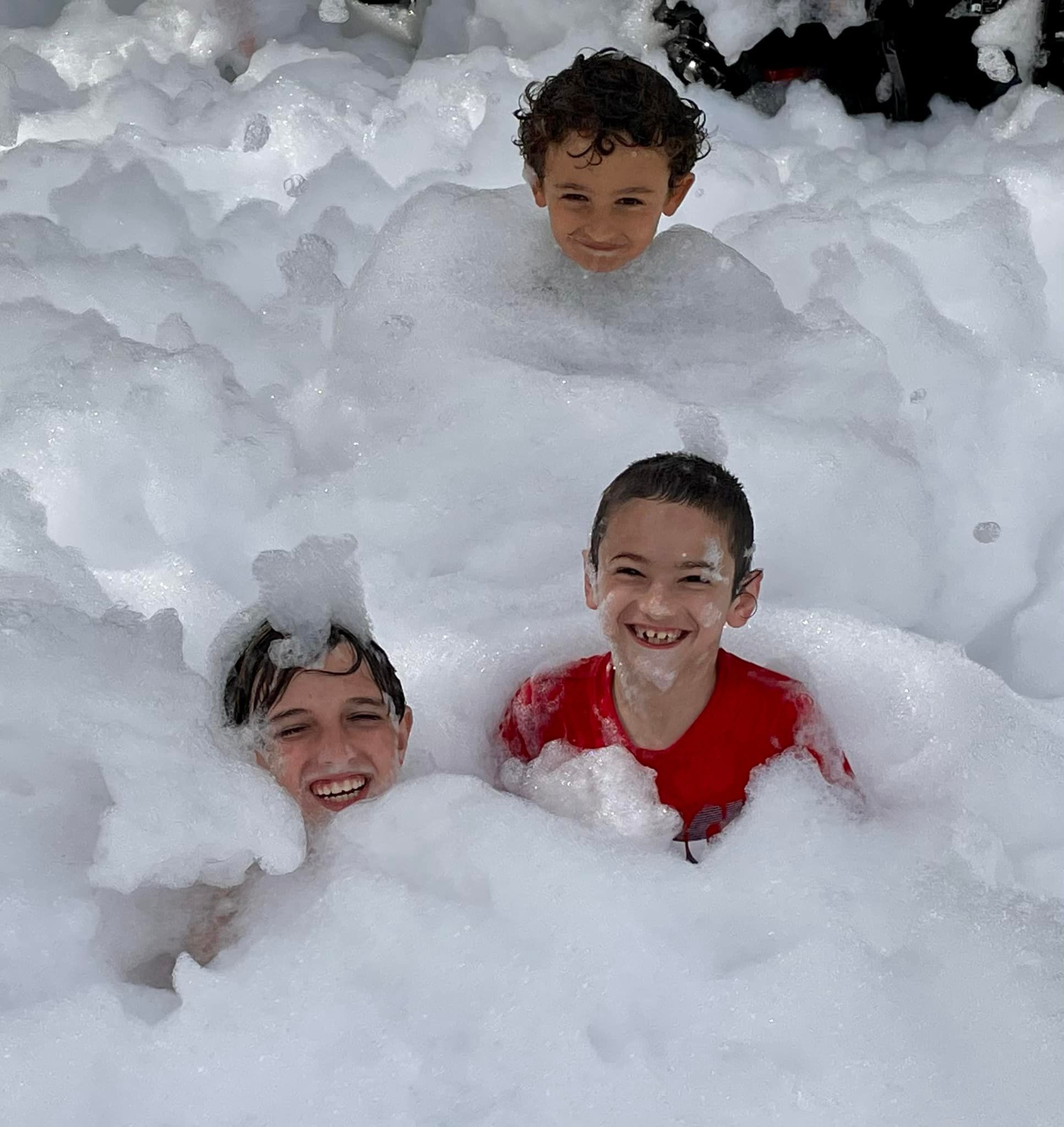 Kids playing in foam at a Foam Palooza party in Oviedo, FL
