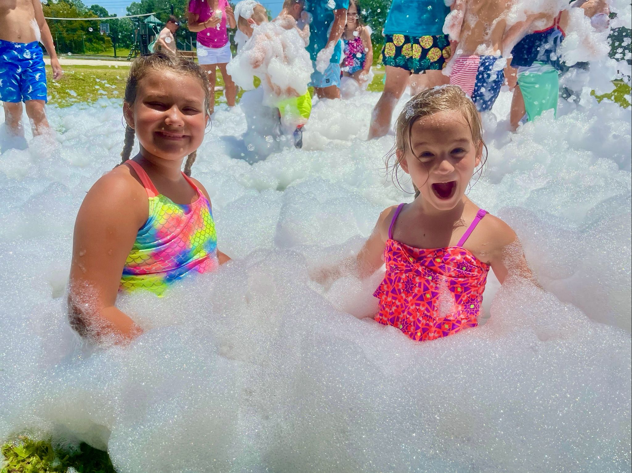 Kids playing in foam at a Foam Palooza party in Lake Nona, FL