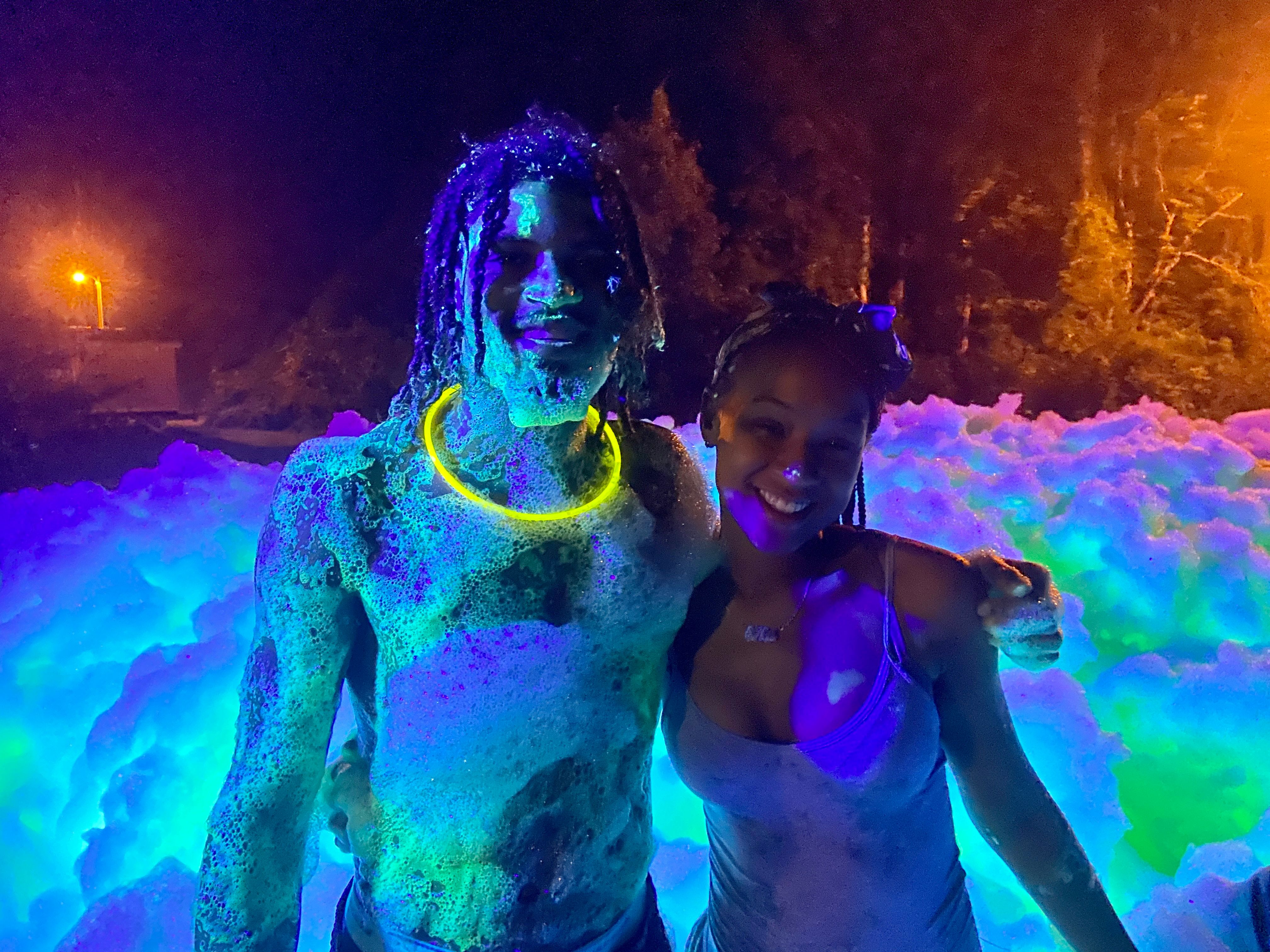 Two kids at a glow foam birthday party in Orlando