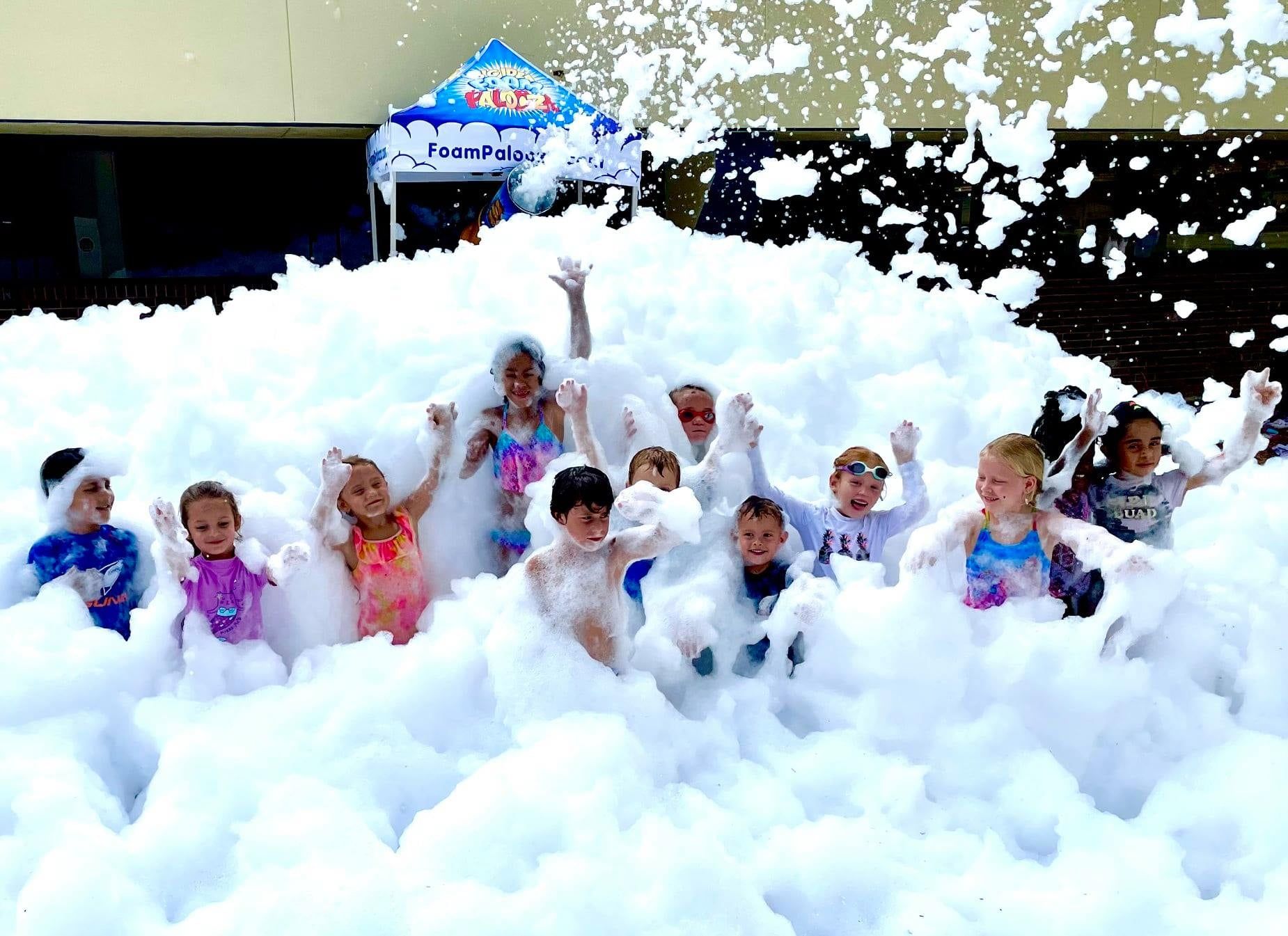 Kids playing in foam at a Foam Palooza party in San Marco, FL