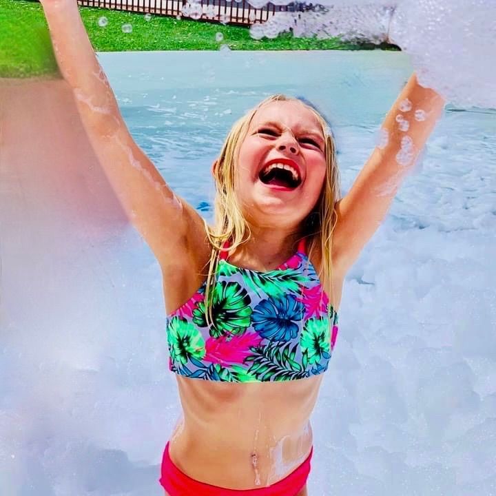 Kids playing in foam at a Foam Palooza party in Brandon, FL