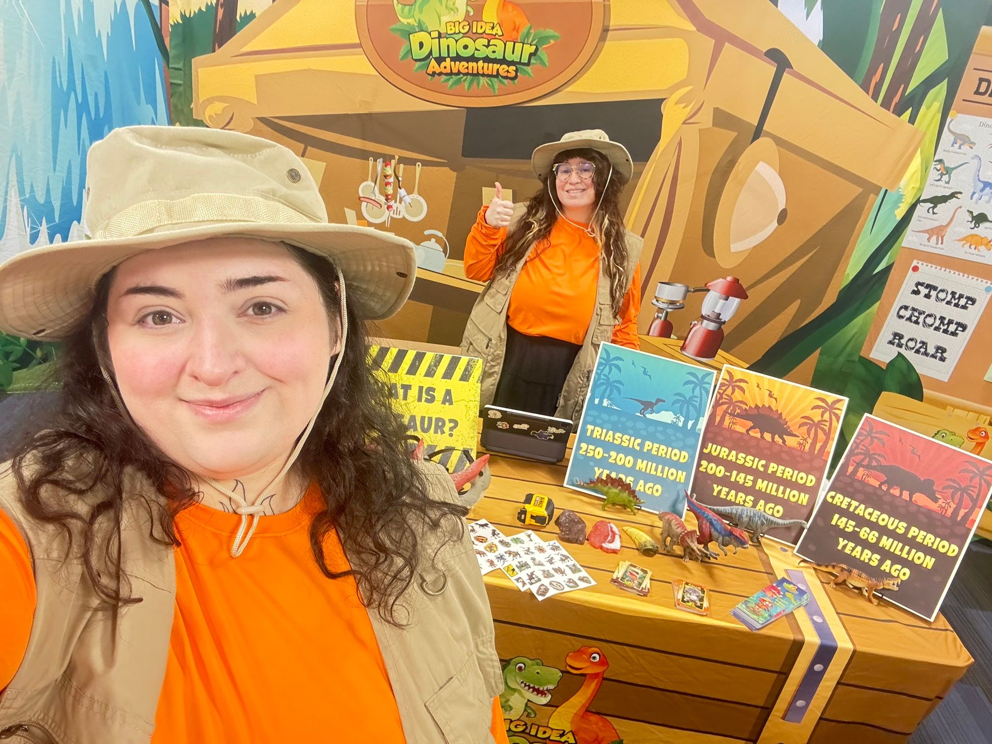 Two Dinosaur Trainers in safari hats at the Dino Research Center