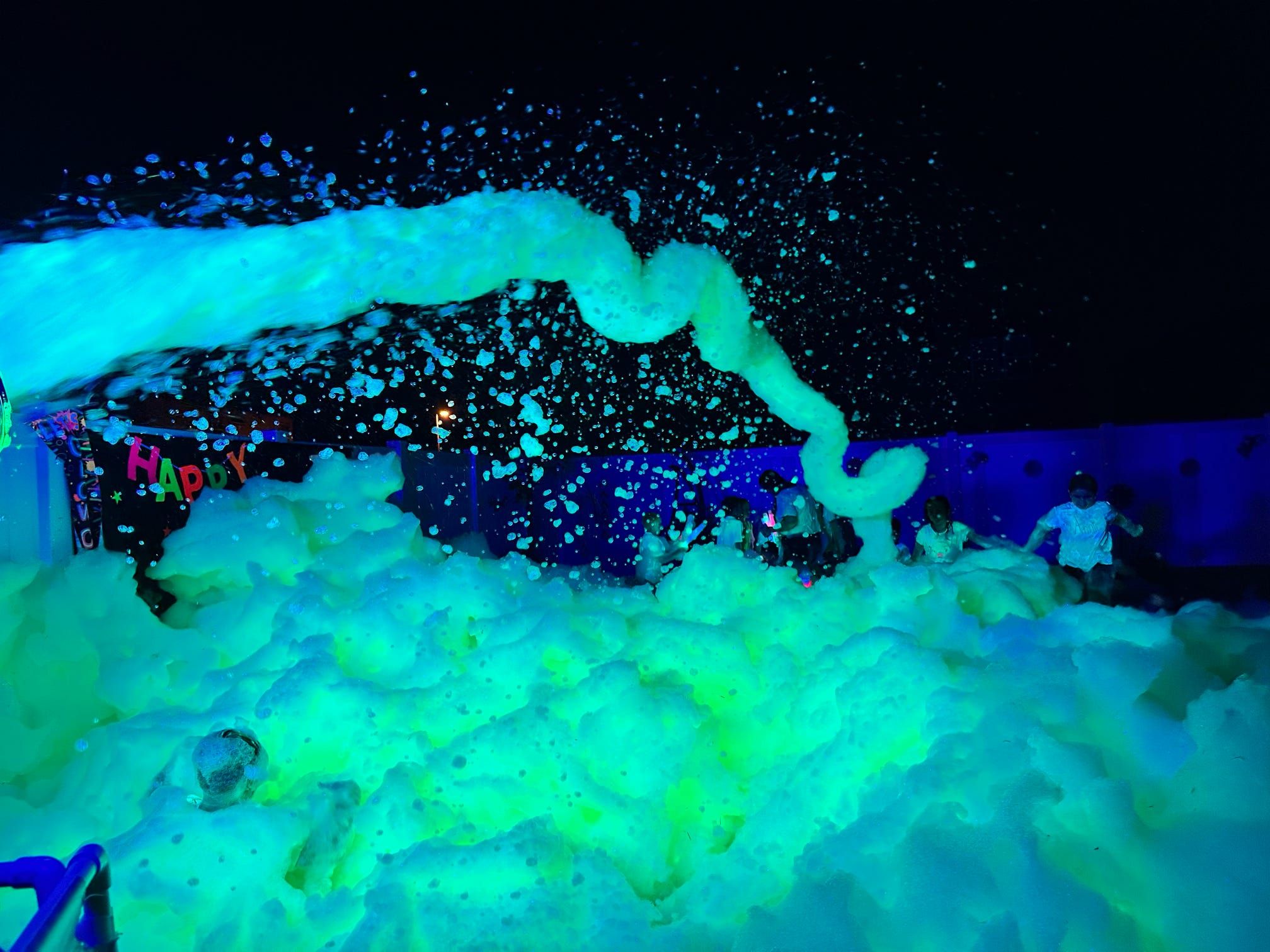 A mountain of glowing foam at a party in Orlando Florida